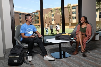 two students in Coyote Village MPR