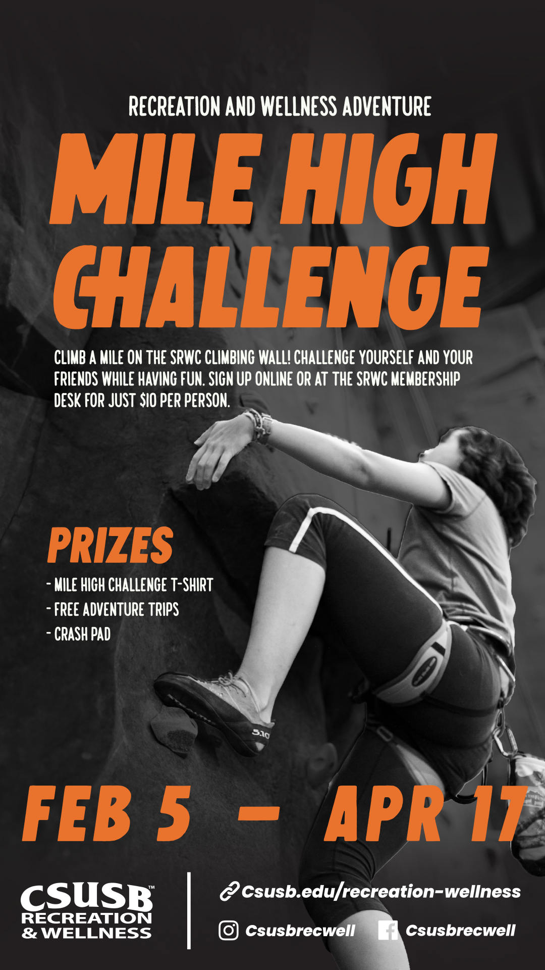 student climbing the rock wall